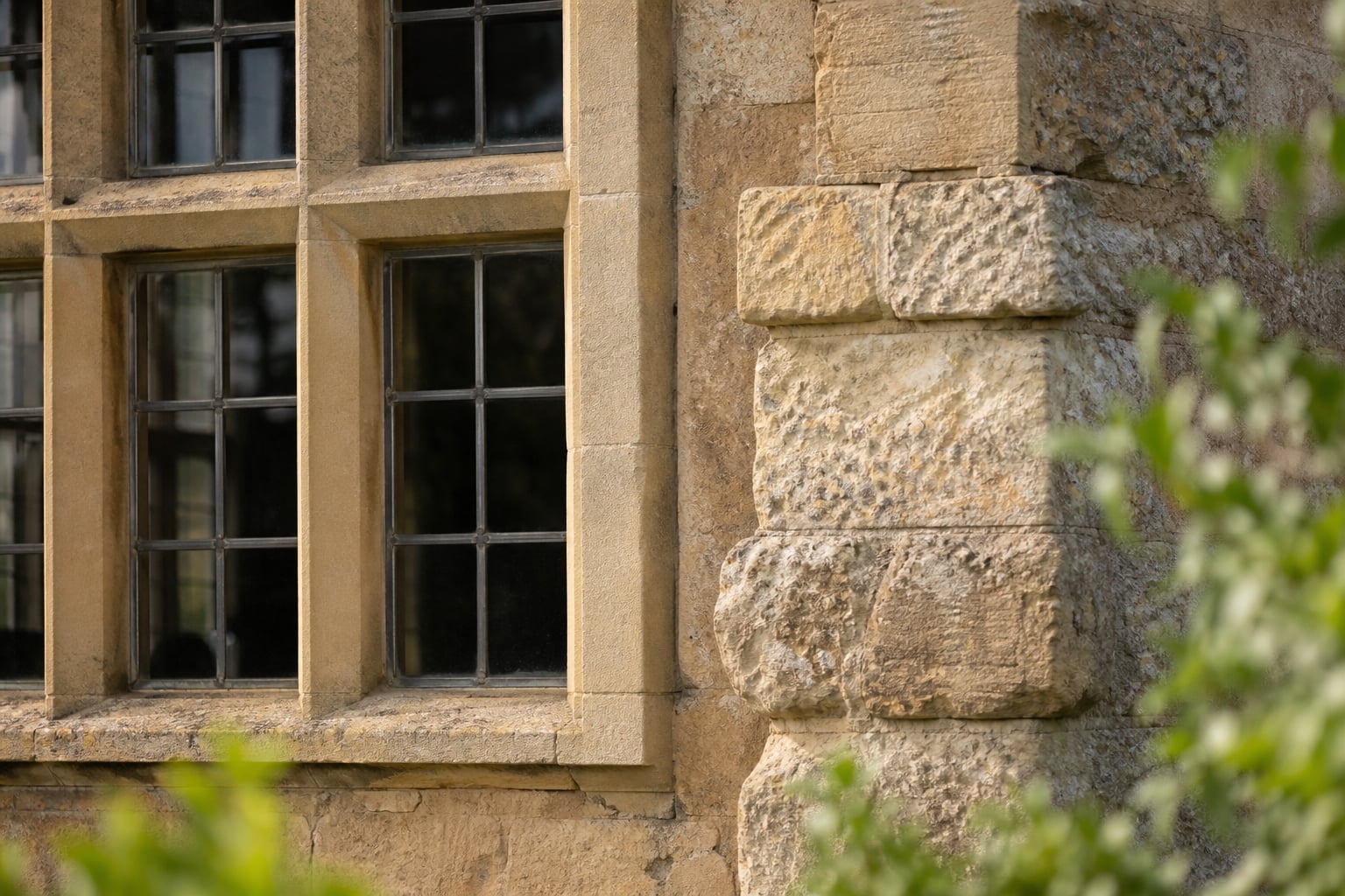 Detail of limestone wall and sash window