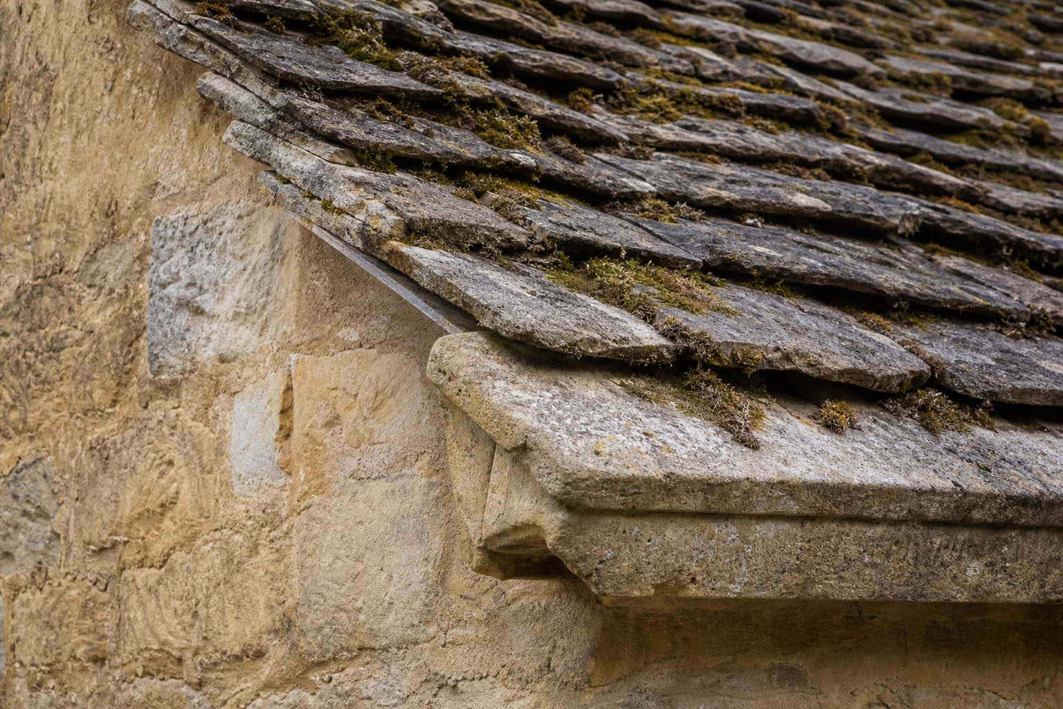 Stone façade detail on a riverside cottage