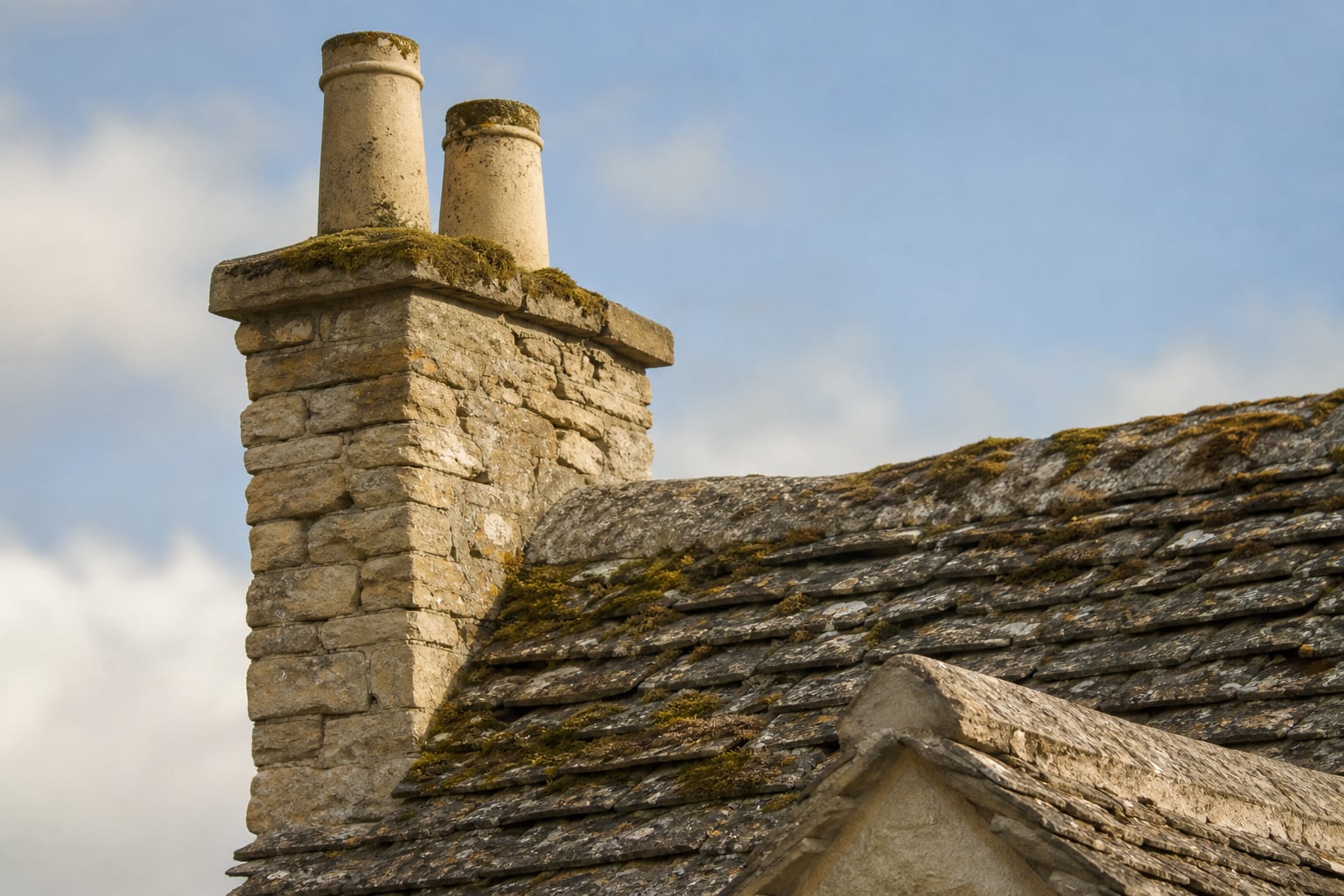 Window joinery detail on Campden limestone
